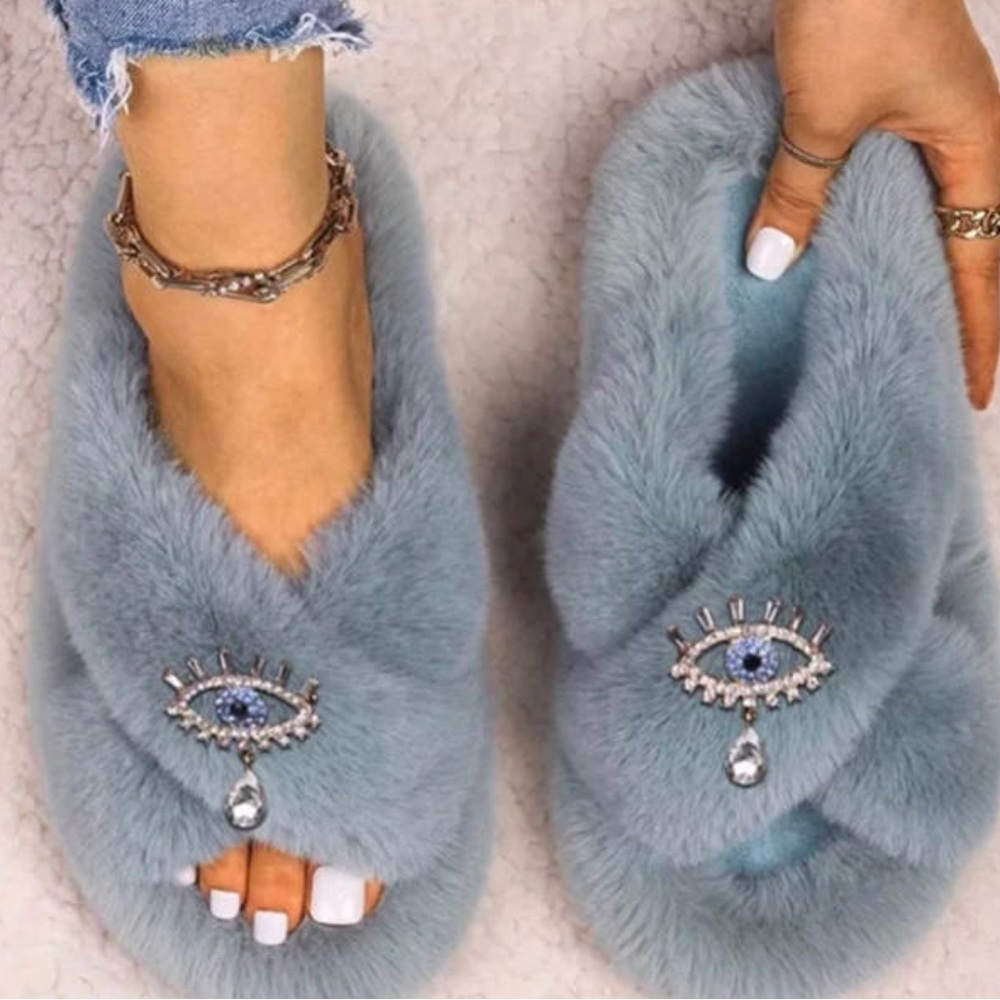 Girls beautiful faux fur slippers with a beautiful jeweled eye charm